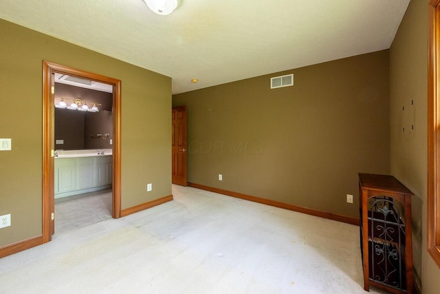 8884 Filiz Ln, Powell, OH 43065 - unfurnished living room with baseboards and light carpet