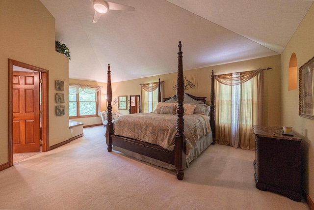 8884 Filiz Ln, Powell, OH 43065 - bedroom featuring light carpet, lofted ceiling, and baseboards