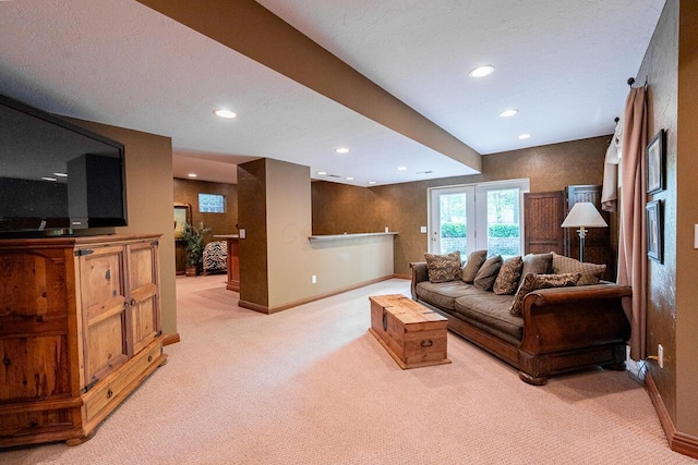 8884 Filiz Ln, Powell, OH 43065 - living room with light carpet, baseboards, and recessed lighting