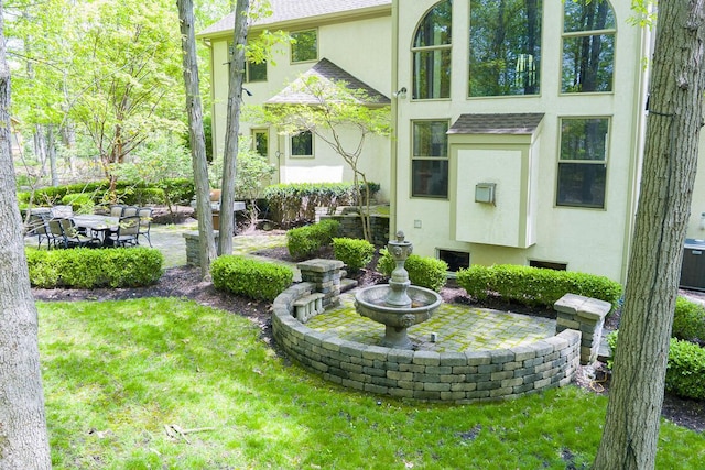 8884 Filiz Ln, Powell, OH 43065 - view of grassy yard featuring a patio