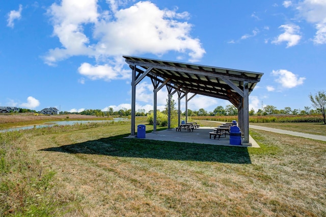 3781 Aviary Loop, Hilliard, OH 43026 - view of home's community featuring a patio, a water view, and a lawn