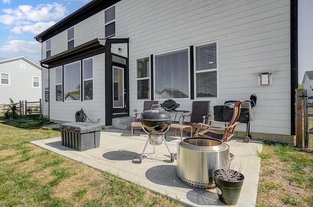3781 Aviary Loop, Hilliard, OH 43026 - rear view of property with a patio, a fire pit, and fence