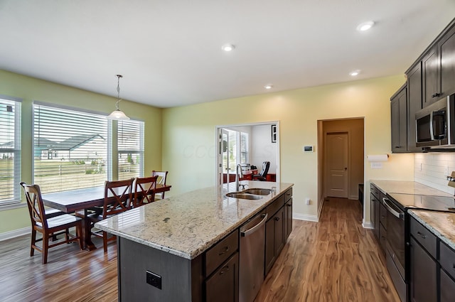 3781 Aviary Loop, Hilliard, OH 43026 - kitchen with a sink, baseboards, dark wood-style floors, and appliances with stainless steel finishes