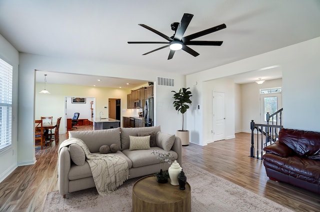 3781 Aviary Loop, Hilliard, OH 43026 - living room with baseboards, visible vents, wood finished floors, and a ceiling fan