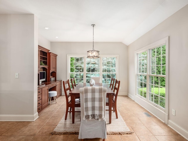 dining space with baseboards, light tile patterned floors, healthy amount of natural light, and recessed lighting