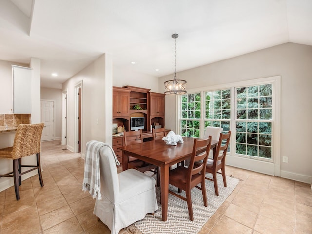 dining space featuring a chandelier, baseboards, light tile patterned floors, and recessed lighting