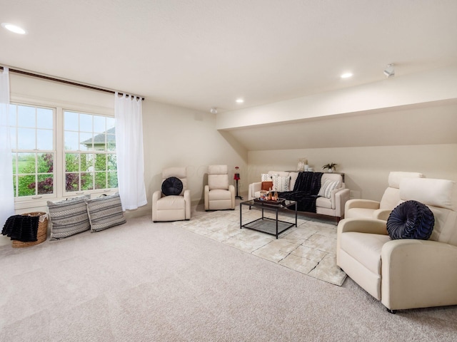 living room featuring light carpet and recessed lighting
