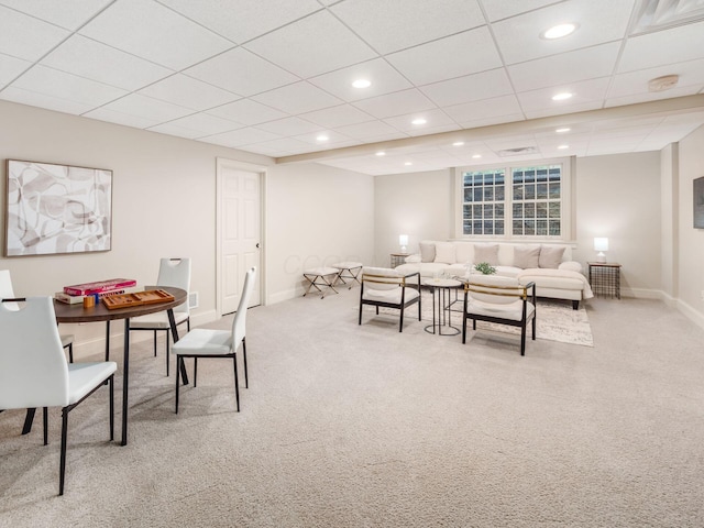 living room featuring baseboards, recessed lighting, and carpet