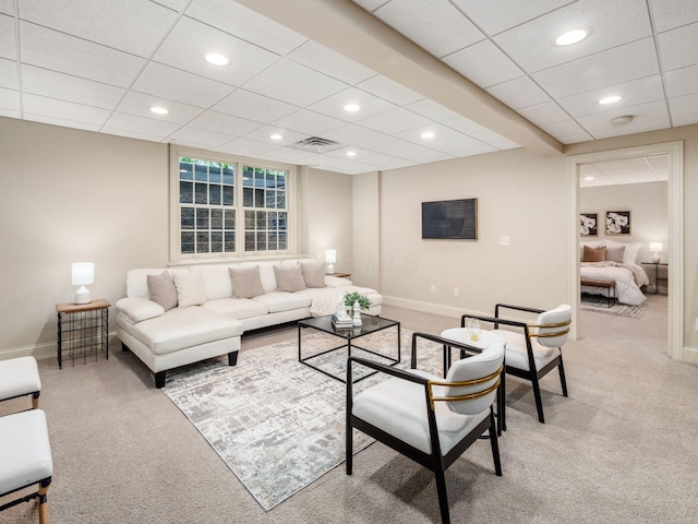 living area featuring carpet floors, baseboards, and recessed lighting