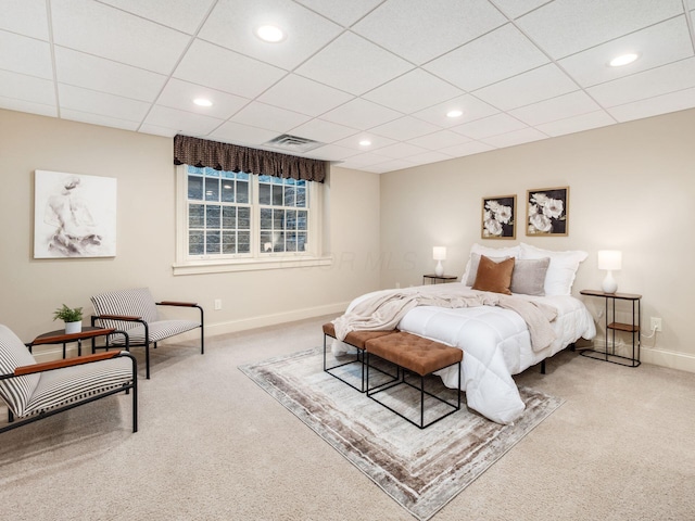 bedroom featuring carpet floors, baseboards, recessed lighting, and a paneled ceiling