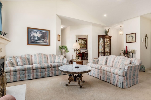carpeted living area featuring recessed lighting and vaulted ceiling