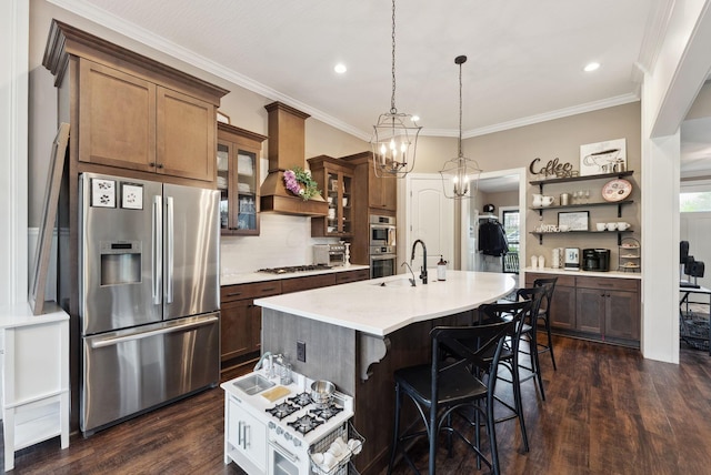 kitchen with open shelves, dark wood-type flooring, light countertops, appliances with stainless steel finishes, and custom range hood