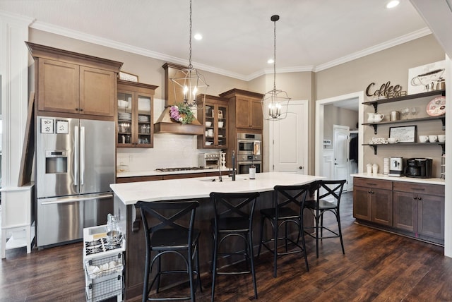 kitchen featuring premium range hood, stainless steel appliances, dark wood-type flooring, backsplash, and light countertops