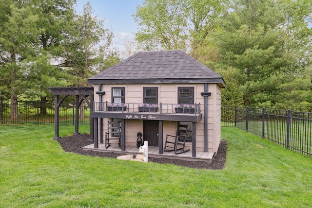view of outdoor structure featuring a fenced backyard