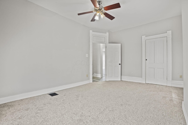 838 Wilson Ave, Columbus, OH 43206 - unfurnished bedroom featuring carpet, a ceiling fan, and baseboards