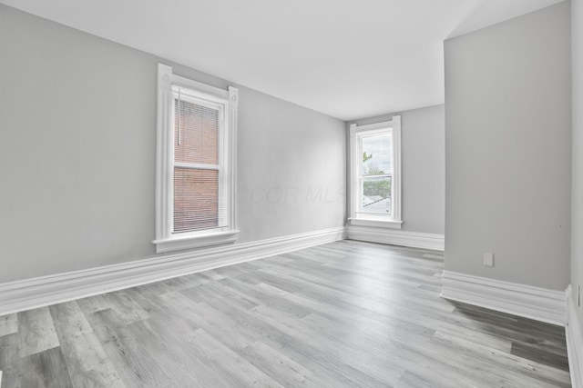 838 Wilson Ave, Columbus, OH 43206 - unfurnished room with wood finished floors and baseboards
