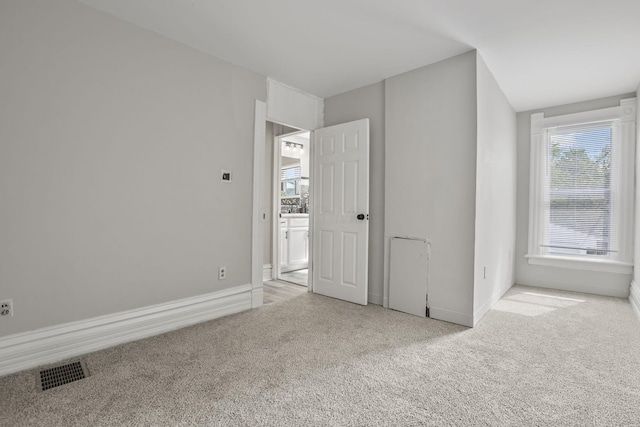 838 Wilson Ave, Columbus, OH 43206 - unfurnished bedroom featuring carpet floors and baseboards