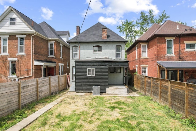 838 Wilson Ave, Columbus, OH 43206 - rear view of property with brick siding and cooling unit