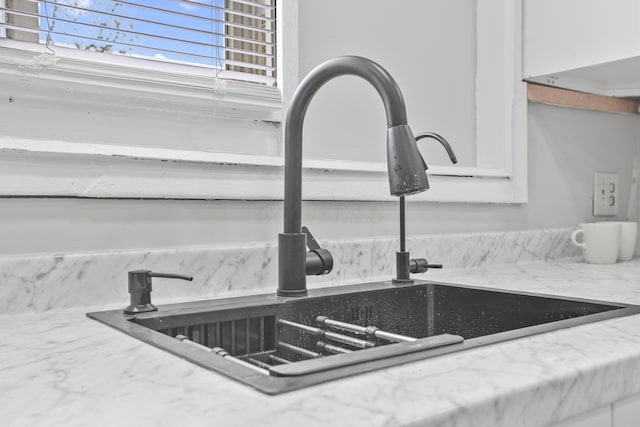 838 Wilson Ave, Columbus, OH 43206 - kitchen view of a sink and light stone countertops