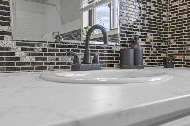 838 Wilson Ave, Columbus, OH 43206 - detailed view of a sink and decorative backsplash