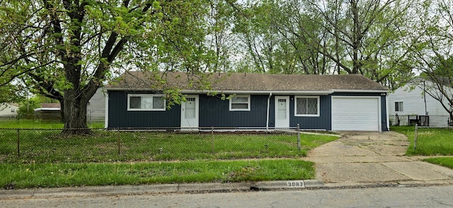 ranch-style house with driveway, a fenced front yard, a front lawn, and a garage