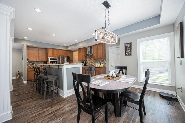 1923 Mallow Ln, Grove City, OH 43123 - dining space with a chandelier, dark wood finished floors, baseboards, and recessed lighting