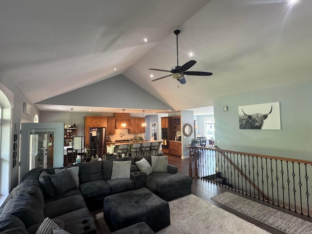 8610 Sadie Thomas Rd NW, Johnstown, OH 43031 - living room featuring ceiling fan, high vaulted ceiling, and dark wood-style floors