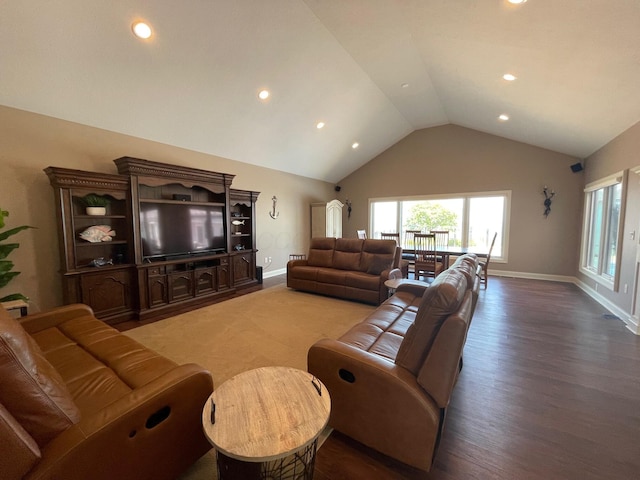3348 W Erie Ave, Lorain, OH 44053 - living area featuring vaulted ceiling, recessed lighting, baseboards, and wood finished floors
