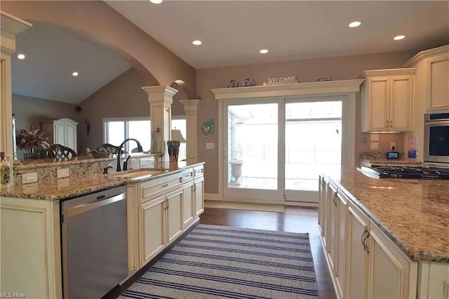 3348 W Erie Ave, Lorain, OH 44053 - kitchen with a sink, ornate columns, recessed lighting, arched walkways, and appliances with stainless steel finishes
