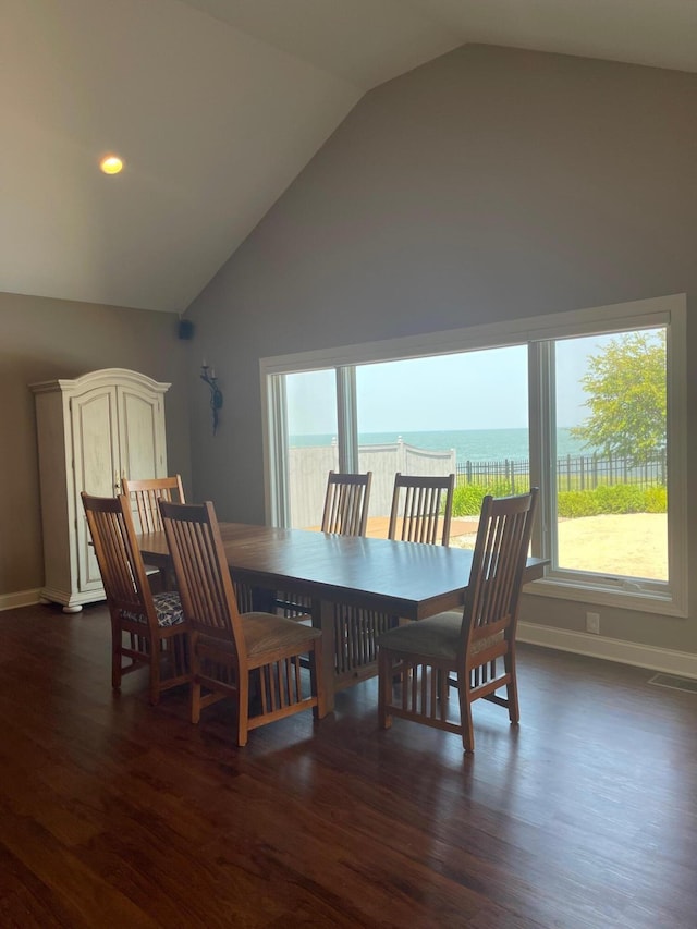 3348 W Erie Ave, Lorain, OH 44053 - dining space featuring visible vents, baseboards, a healthy amount of sunlight, and dark wood-style floors