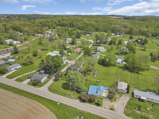 aerial view with a wooded view