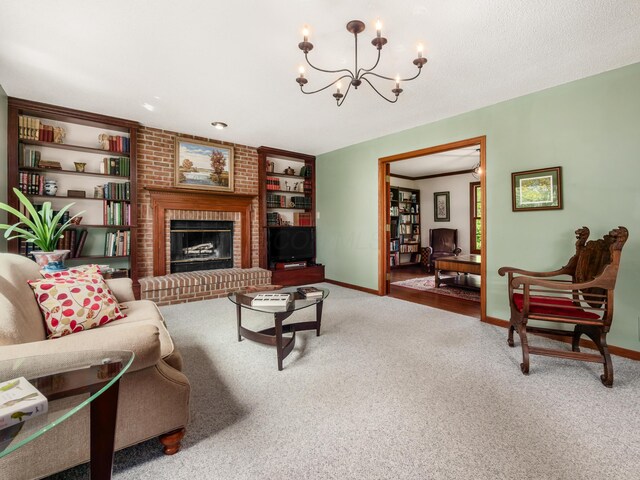 living area featuring carpet, baseboards, a chandelier, and built in features