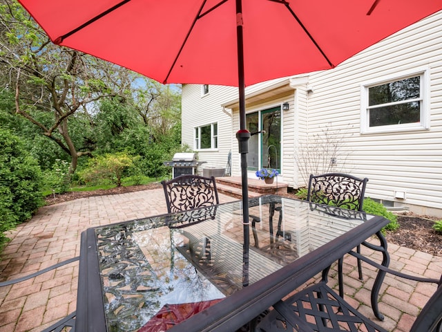 view of patio featuring outdoor dining space and area for grilling