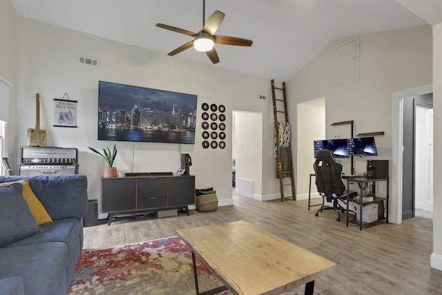 265 E St, Buckeye Lake, OH 43008 - living area with ceiling fan, wood finished floors, vaulted ceiling, and baseboards