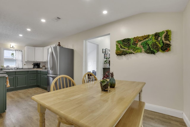 265 E St, Buckeye Lake, OH 43008 - dining room featuring light wood finished floors, recessed lighting, and baseboards