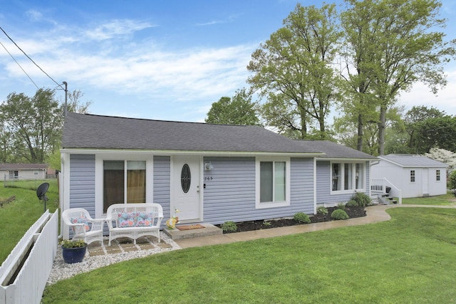 265 E St, Buckeye Lake, OH 43008 - view of front facade featuring roof with shingles