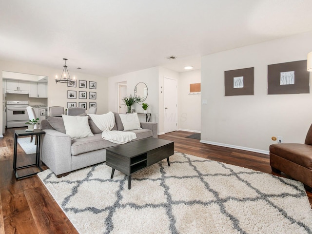 2059 Park Run Dr Unit D, Columbus, OH 43220 - living room featuring recessed lighting, baseboards, an inviting chandelier, visible vents, and dark wood-type flooring