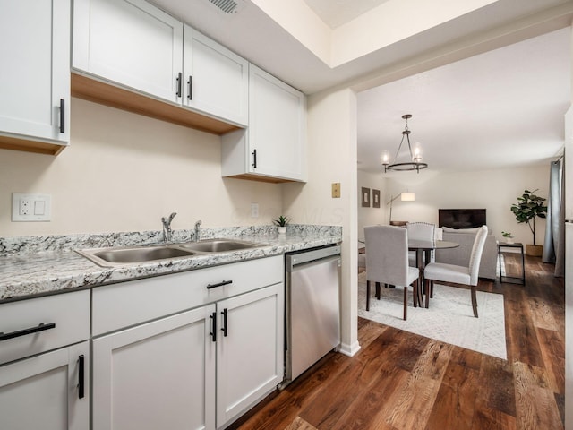 2059 Park Run Dr Unit D, Columbus, OH 43220 - kitchen featuring a sink, dark wood-type flooring, an inviting chandelier, white cabinets, and stainless steel dishwasher