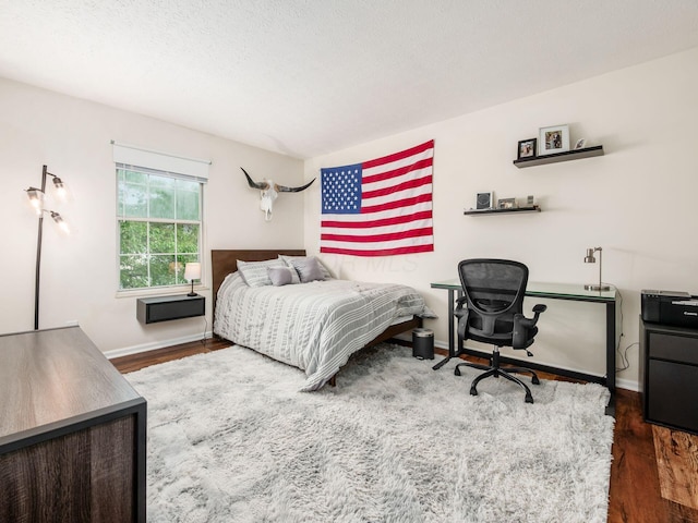 2059 Park Run Dr Unit D, Columbus, OH 43220 - bedroom featuring baseboards and dark wood finished floors
