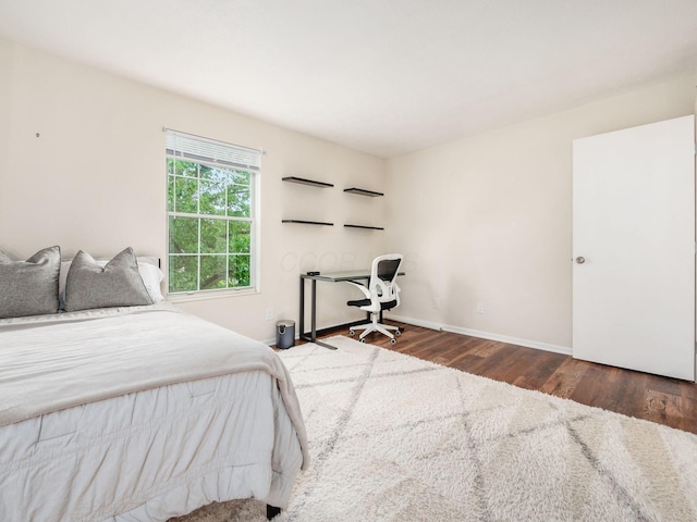 2059 Park Run Dr Unit D, Columbus, OH 43220 - bedroom featuring baseboards and wood finished floors