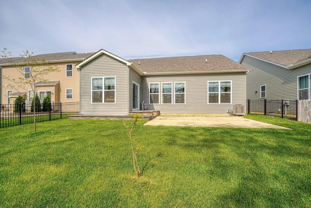 6332 Celeste St, Westerville, OH 43081 - back of house with roof with shingles, a fenced backyard, cooling unit, a patio area, and a yard