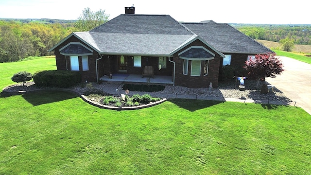 1305 Bald Hill Rd, Zanesville, OH 43701 - ranch-style home featuring covered porch, a front yard, driveway, a chimney, and brick siding
