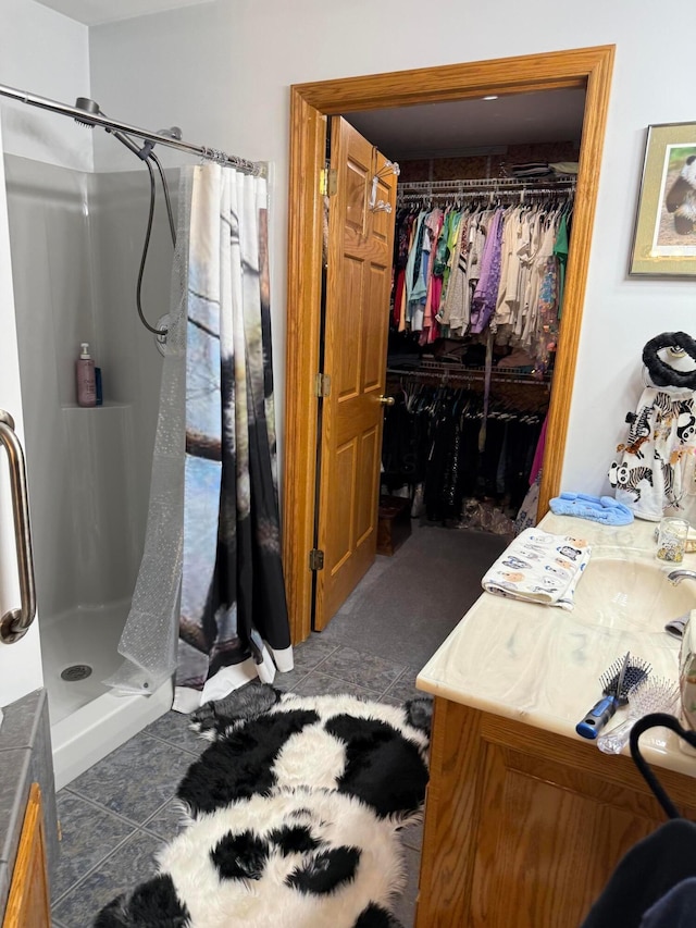 1305 Bald Hill Rd, Zanesville, OH 43701 - full bath featuring a shower stall, vanity, and a spacious closet