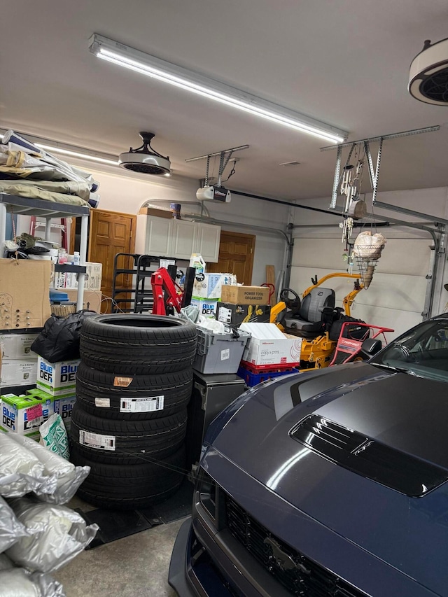 1305 Bald Hill Rd, Zanesville, OH 43701 - garage featuring a garage door opener