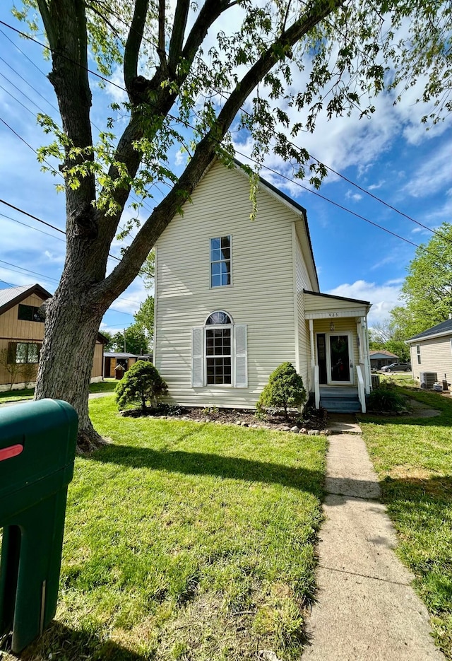 view of front of property with a front lawn