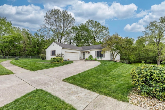 1702 Valley Forge Dr, Lancaster, OH 43130 - ranch-style house featuring concrete driveway, a front yard, fence, and a garage