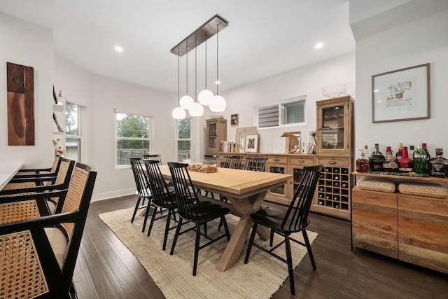 dining space featuring recessed lighting and dark wood-style flooring
