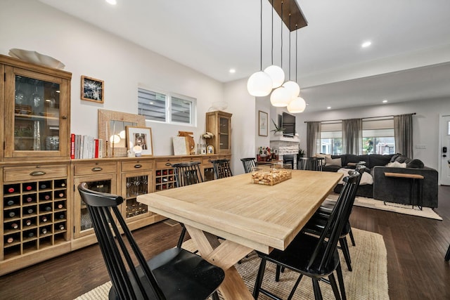 dining room featuring recessed lighting and dark wood-type flooring