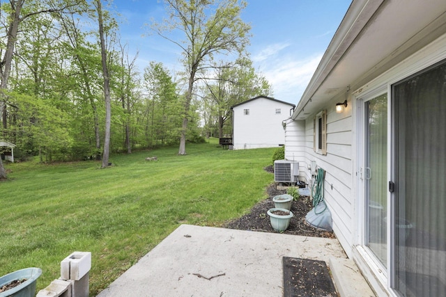 view of yard with a patio area and cooling unit
