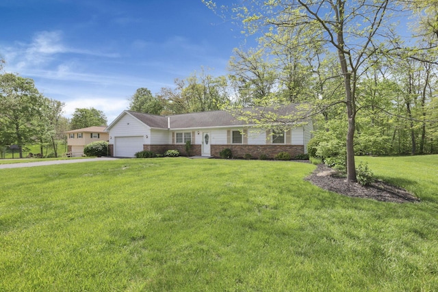 ranch-style home featuring concrete driveway, a garage, brick siding, and a front yard